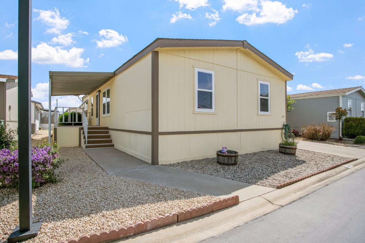 a front view of a house with entertaining space