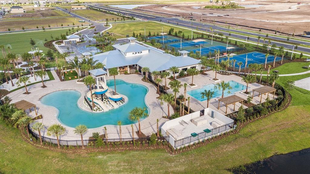 5253 Everlong Drive Apollo Beach, FL 33572 - Photo 7 of 7 a aerial view of a house with swimming pool and outdoor seating