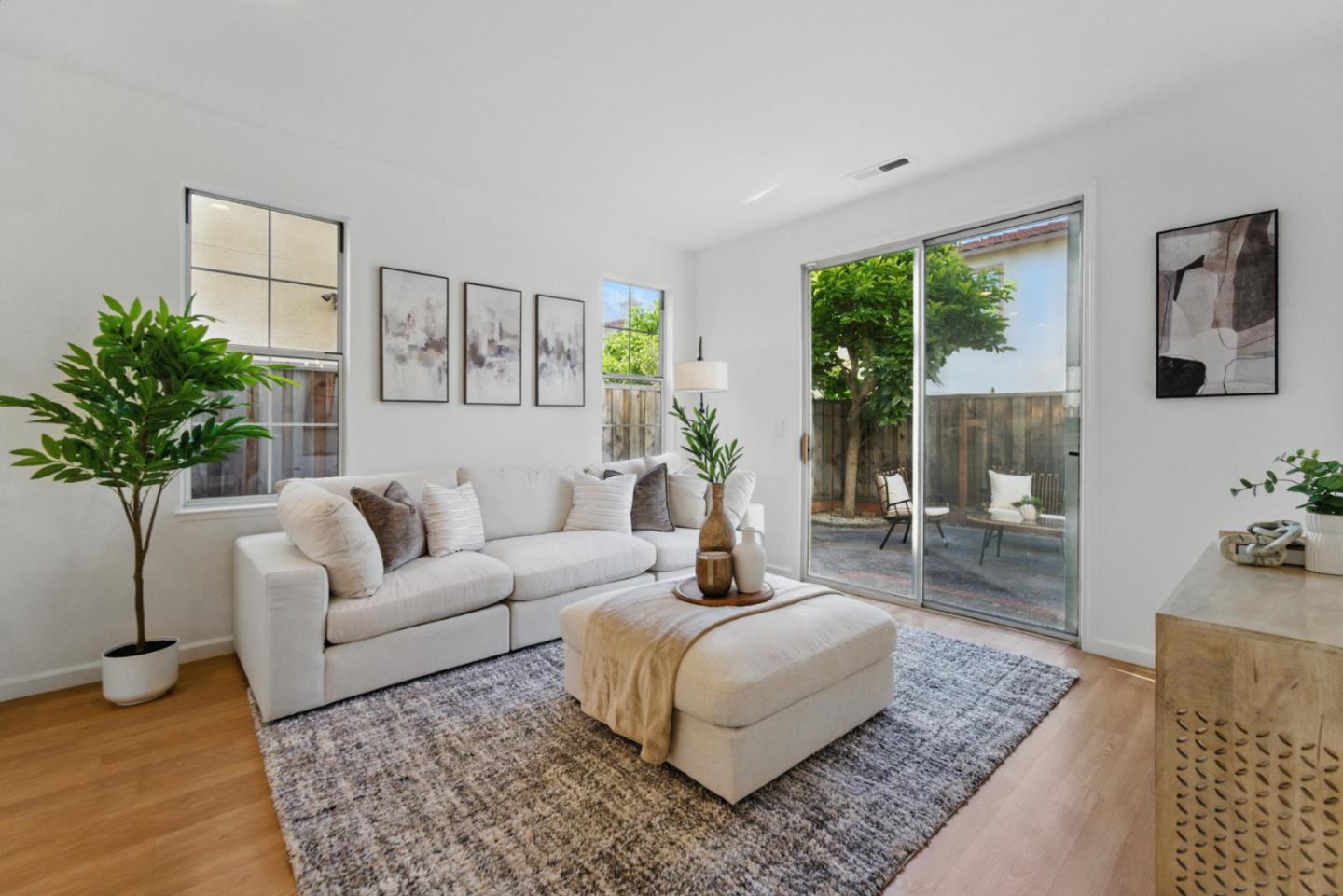 560 Villa Centre Way San Jose, CA 95128 - Photo 13 of 31 a living room with furniture and a potted plant