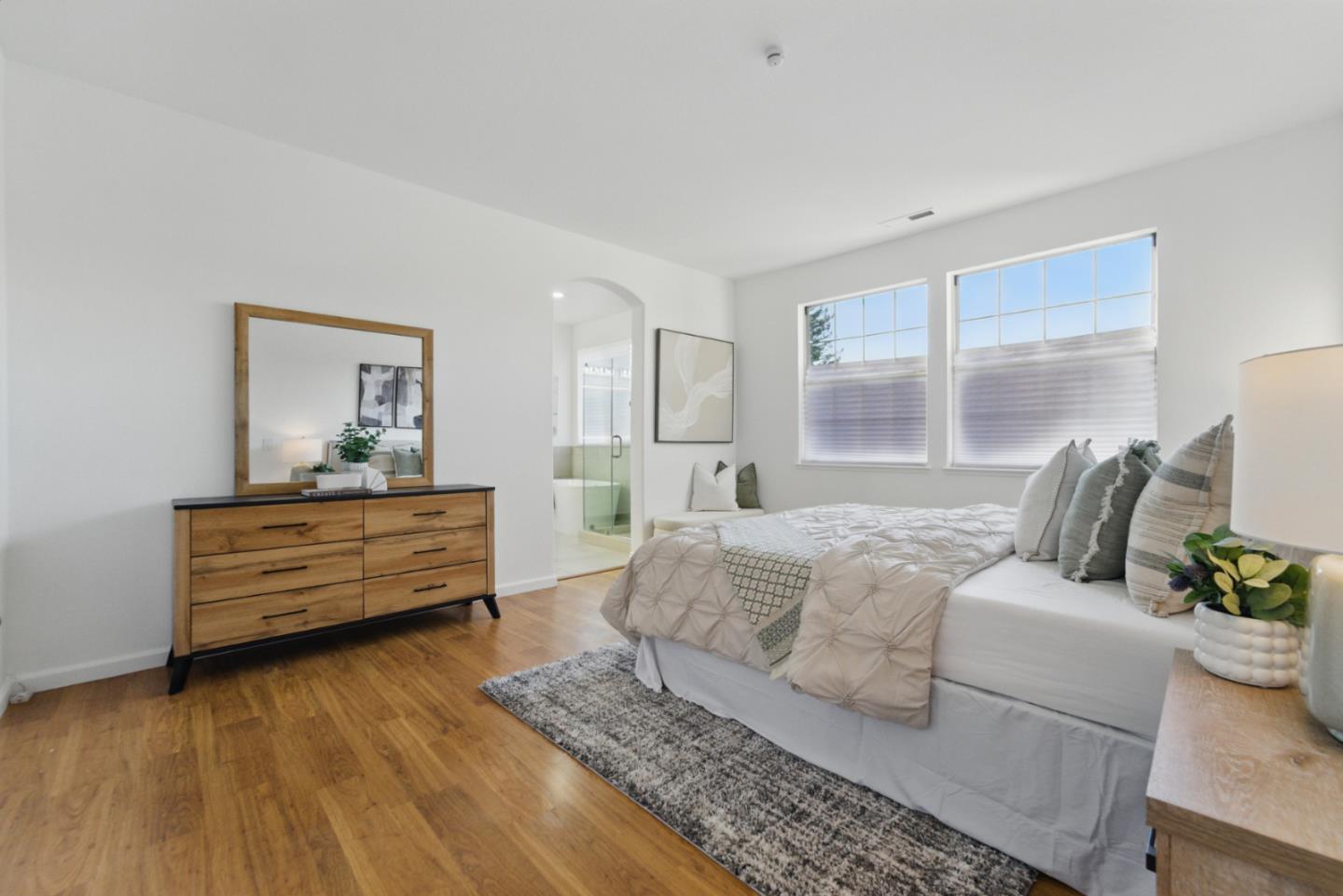 560 Villa Centre Way San Jose, CA 95128 - Photo 15 of 31 a bedroom with a bed and wooden floor