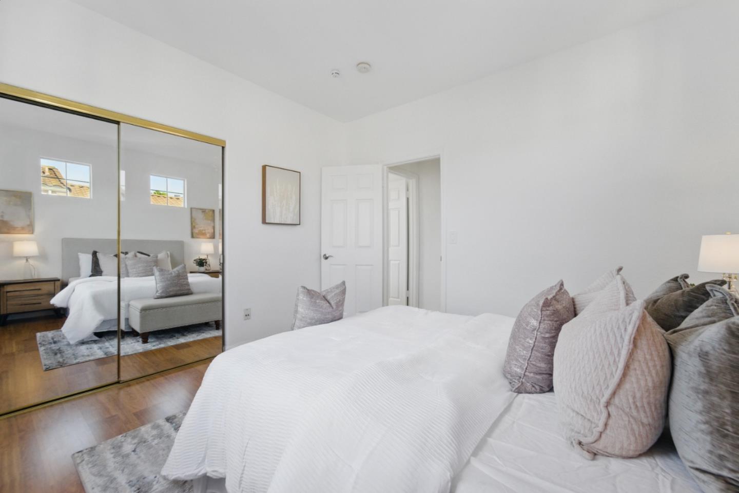 560 Villa Centre Way San Jose, CA 95128 - Photo 24 of 31 a bedroom with a bed and a couch