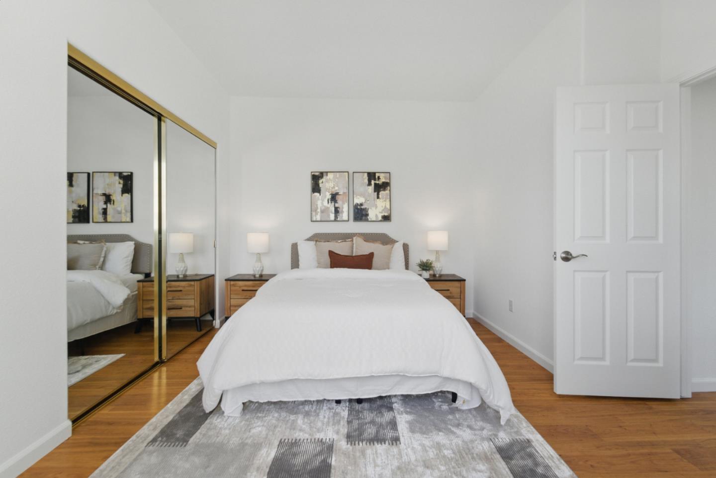 560 Villa Centre Way San Jose, CA 95128 - Photo 26 of 31 a bedroom with a large bed and a walk in closet