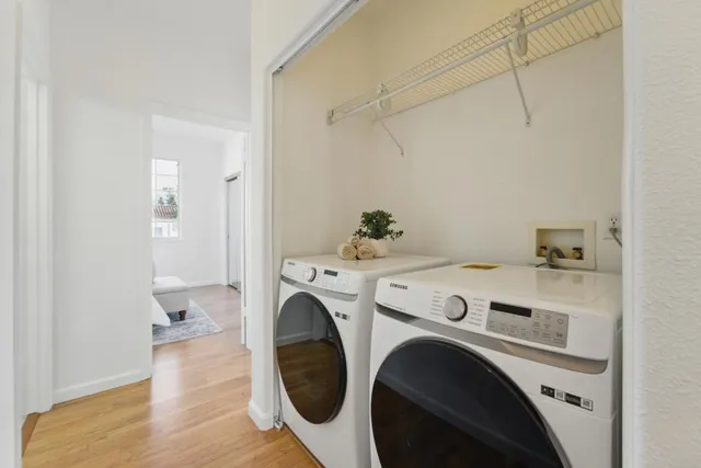 a view of livingroom with washer and dryer
