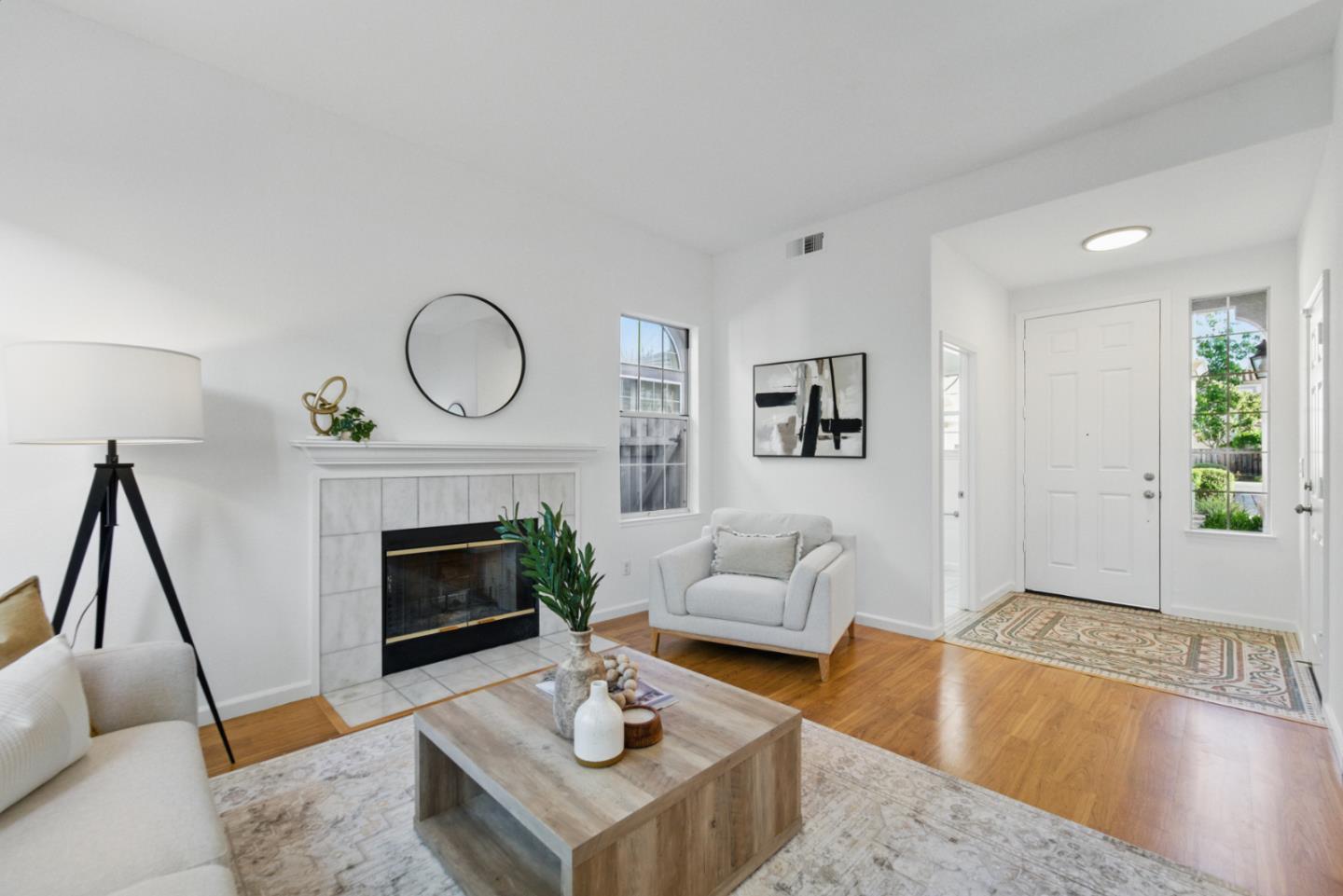 560 Villa Centre Way San Jose, CA 95128 - Photo 3 of 31 a living room with furniture and a fireplace