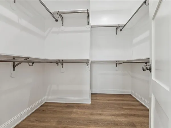 a view of an empty walk in closet