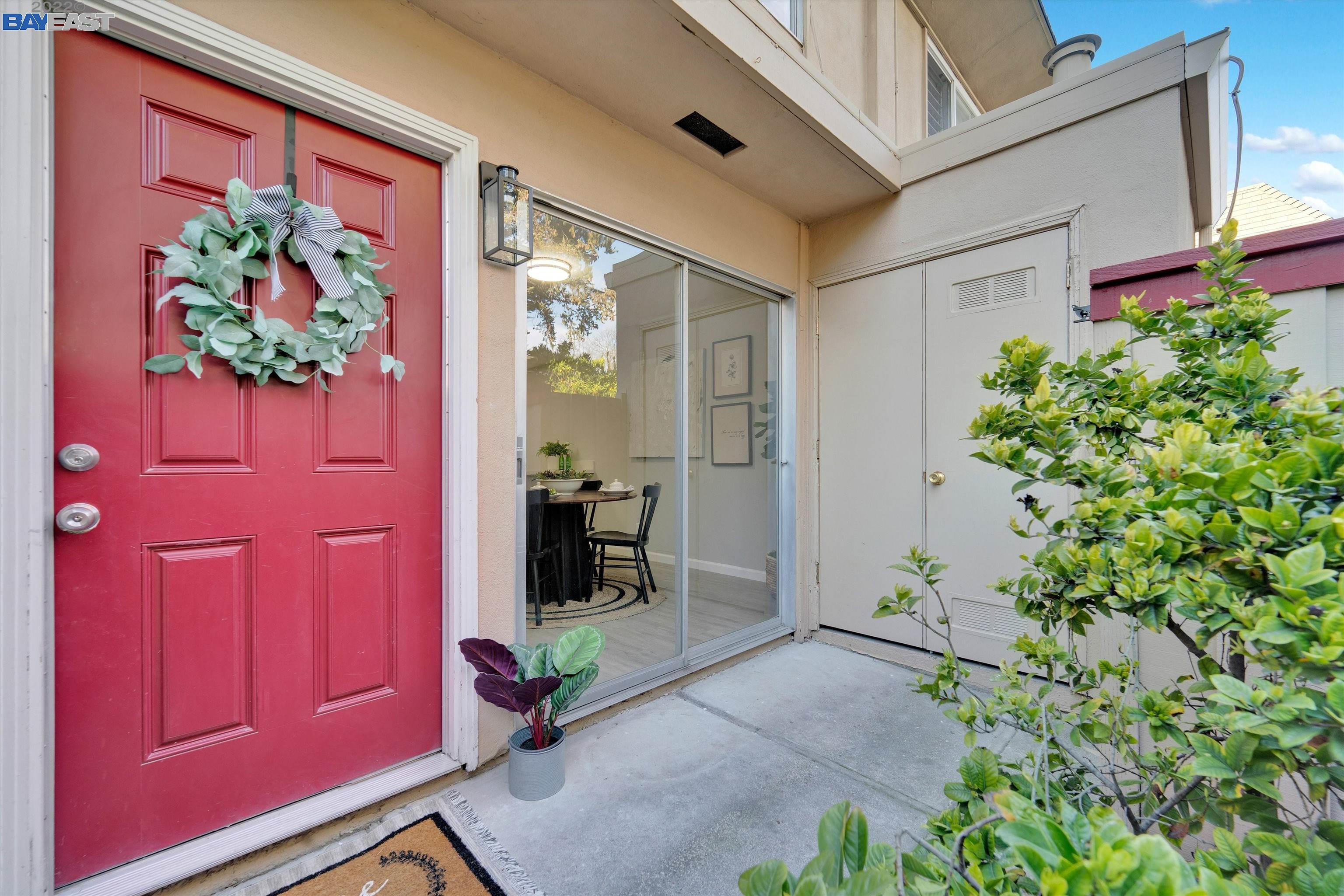 1036 Bancroft Road Concord, CA 94518 - Photo 1 of 1 an entryway with a flower pot and a potted plant