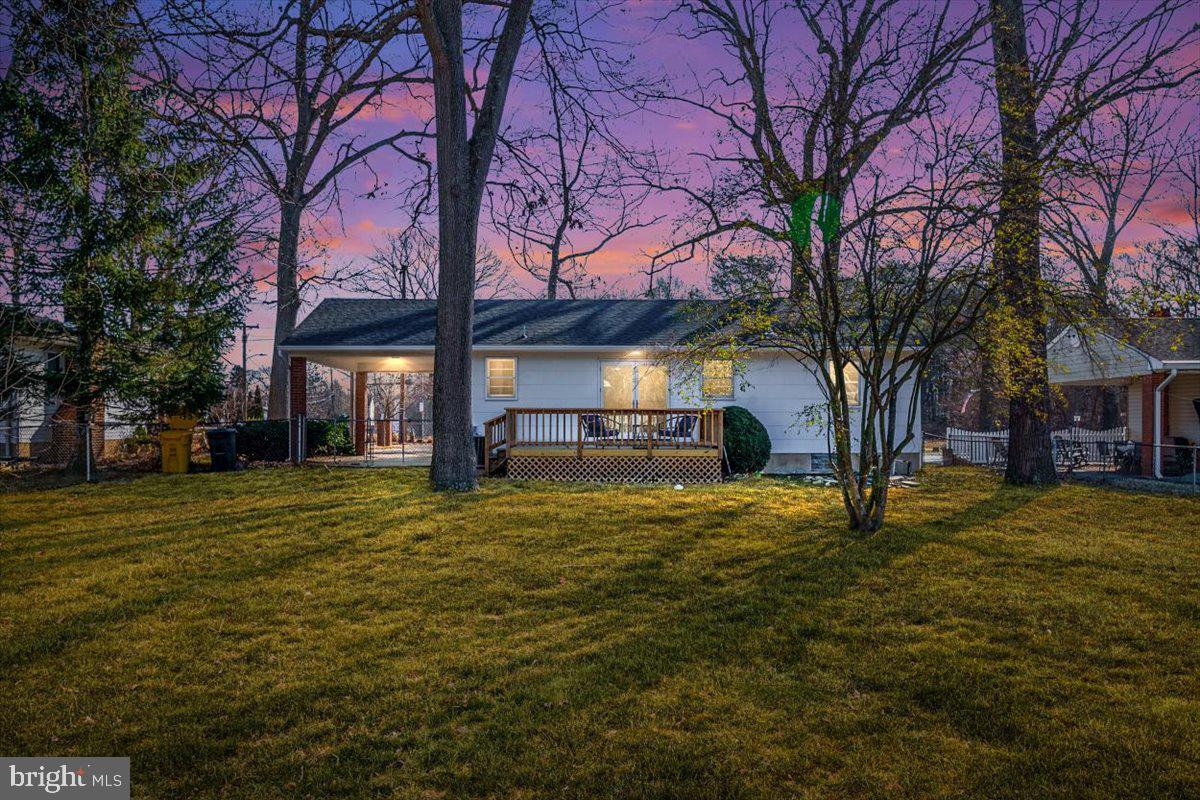 36 Carroll Road Pasadena, MD 21122 - Photo 2 of 37 a front view of a house with a yard