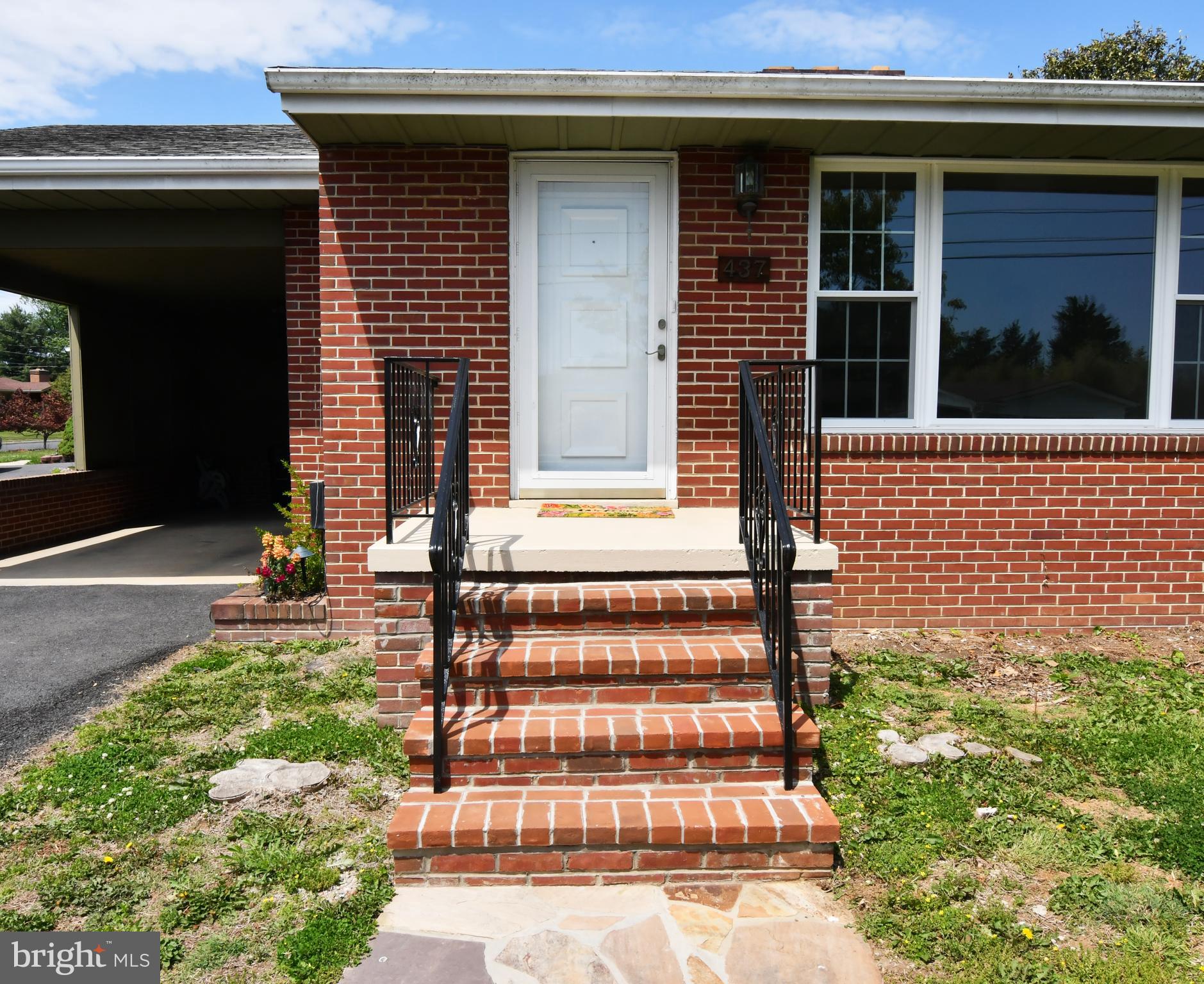 437 Beechcroft Road Winchester, VA 22601 - Photo 8 of 52 a front view of a house with a yard
