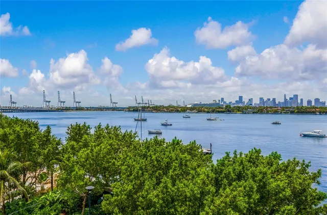 a balcony view with couple of chairs