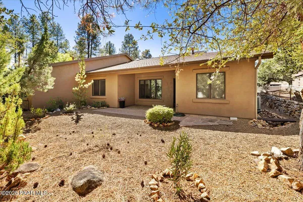 a view of outdoor space with wooden fence