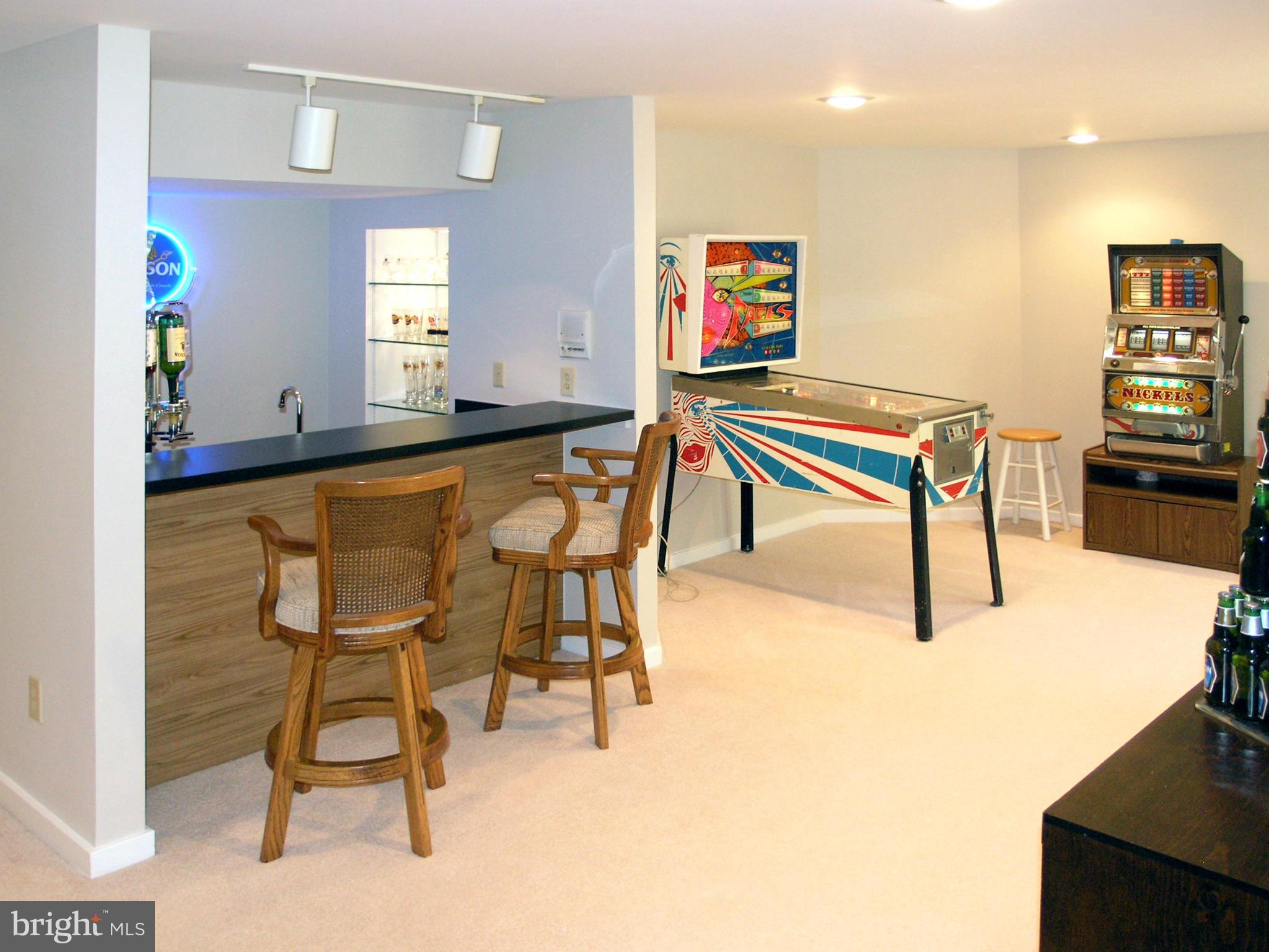 11301 Woodbrook Lane Reston, VA 20194 - Photo 24 of 30 Wet Bar and Game Room