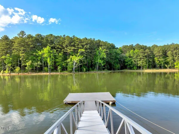 a view of a lake with a outdoor space