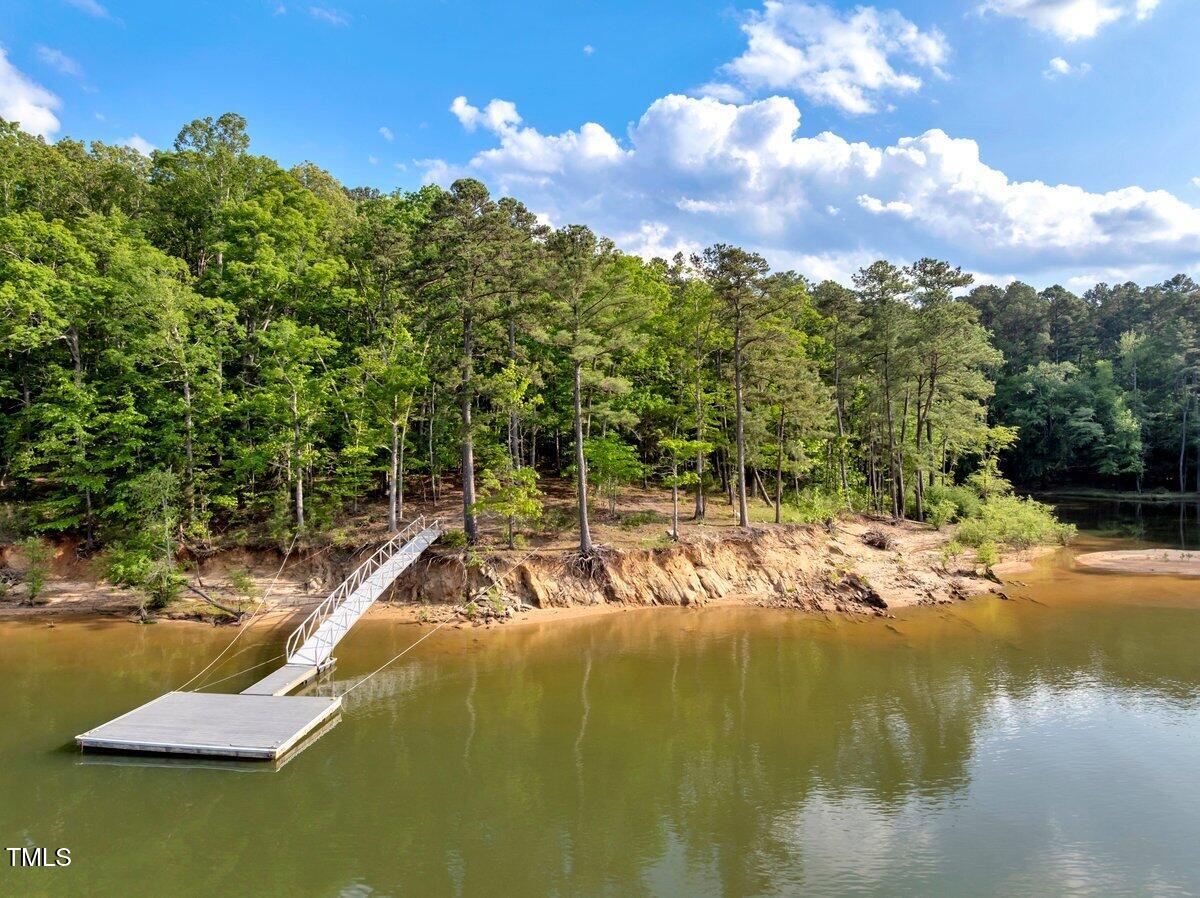 1.95-acres Buchanan Road Manson, NC 27553 - Photo 7 of 15 a view of a lake with a house