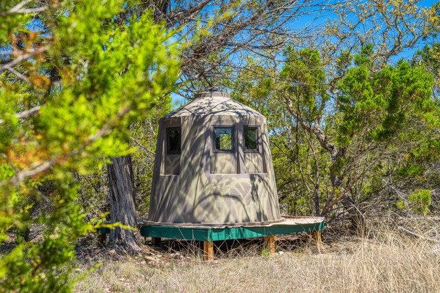 1135 Byas Springs Road Mountain Home, TX 78058 - Photo 17 of 23 a view of a bird bath