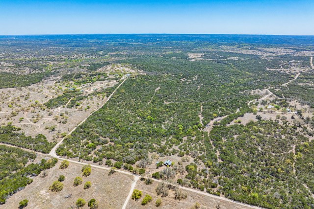 1135 Byas Springs Road Mountain Home, TX 78058 - Photo 3 of 23 a view of an ocean from a balcony