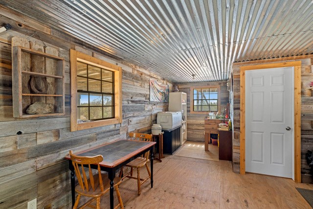 1135 Byas Springs Road Mountain Home, TX 78058 - Photo 7 of 23 a dining room with furniture and window