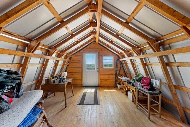 1135 Byas Springs Road Mountain Home, TX 78058 - Photo 8 of 23 a view of outdoor space with wooden floor and furniture