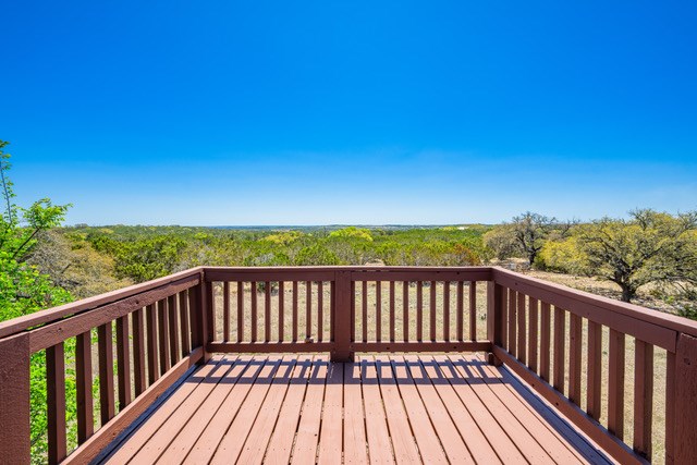 1135 Byas Springs Road Mountain Home, TX 78058 - Photo 10 of 23 a view of city with a balcony
