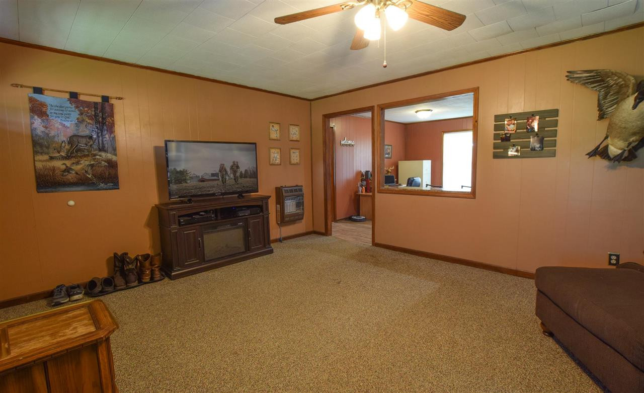 947 South Wolverine Road Troy, TN 38260 - Photo 12 of 20 a bedroom with furniture and window