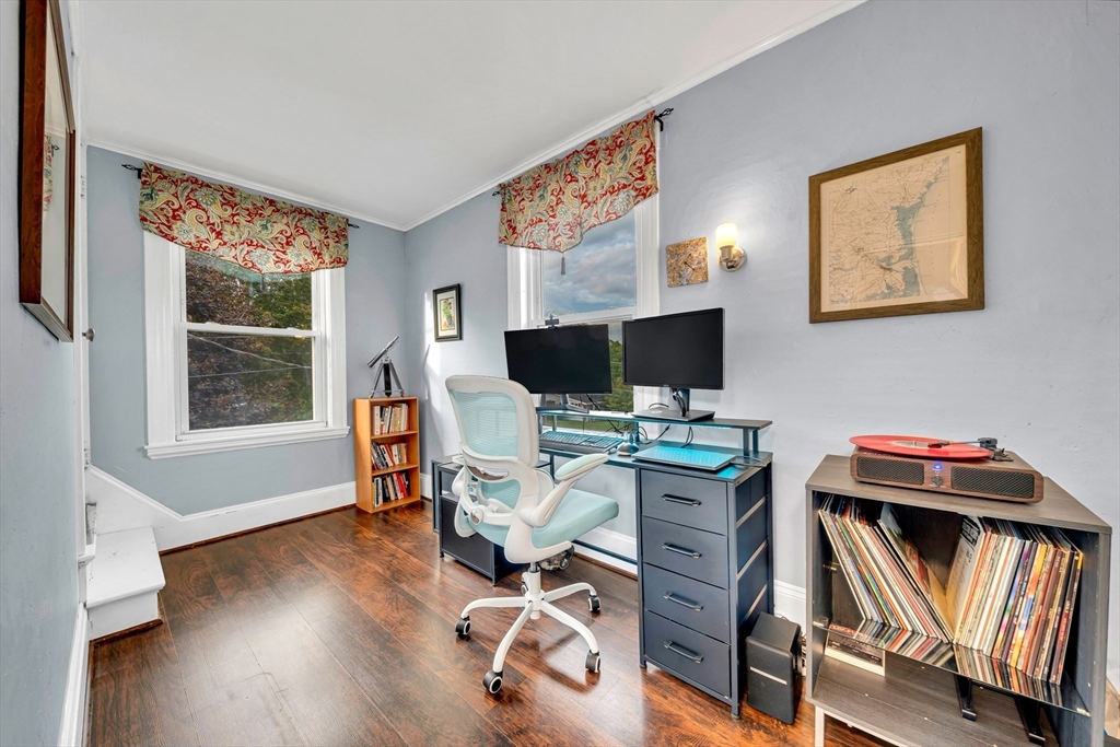 7 Melrose Street Amesbury, MA 01913 - Photo 17 of 34 a view of a workspace with furniture and a window