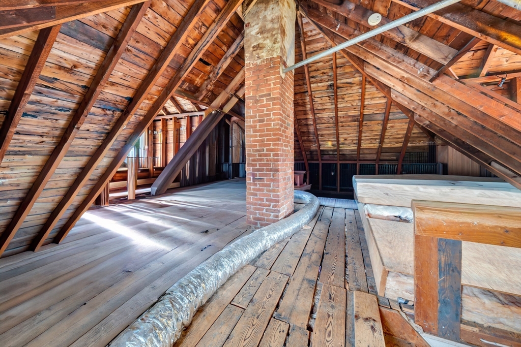 7 Melrose Street Amesbury, MA 01913 - Photo 18 of 34 a view of entryway with wooden floor