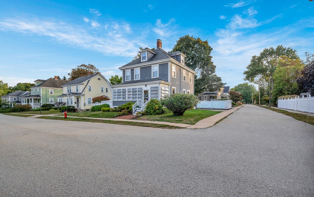 7 Melrose Street Amesbury, MA 01913 - Photo 2 of 34 a view of a street with a houses
