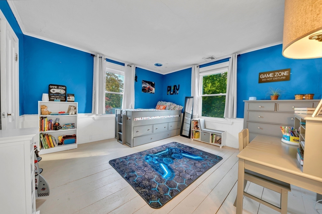 7 Melrose Street Amesbury, MA 01913 - Photo 22 of 34 a living room with furniture rug and window