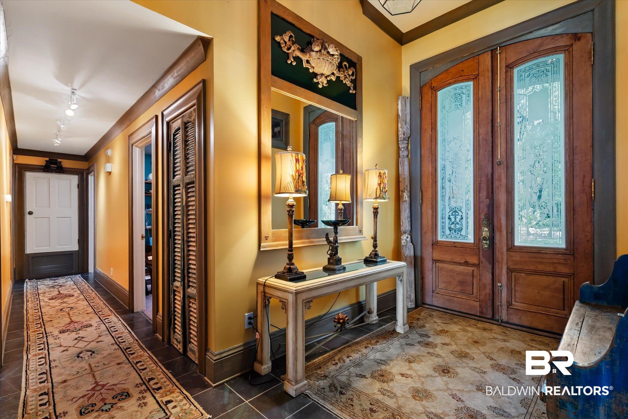 3325 Riviere Du Chien Road Mobile, AL 36693 - Photo 25 of 71 Tiled entrance foyer featuring rail lighting, crown molding, and french doors