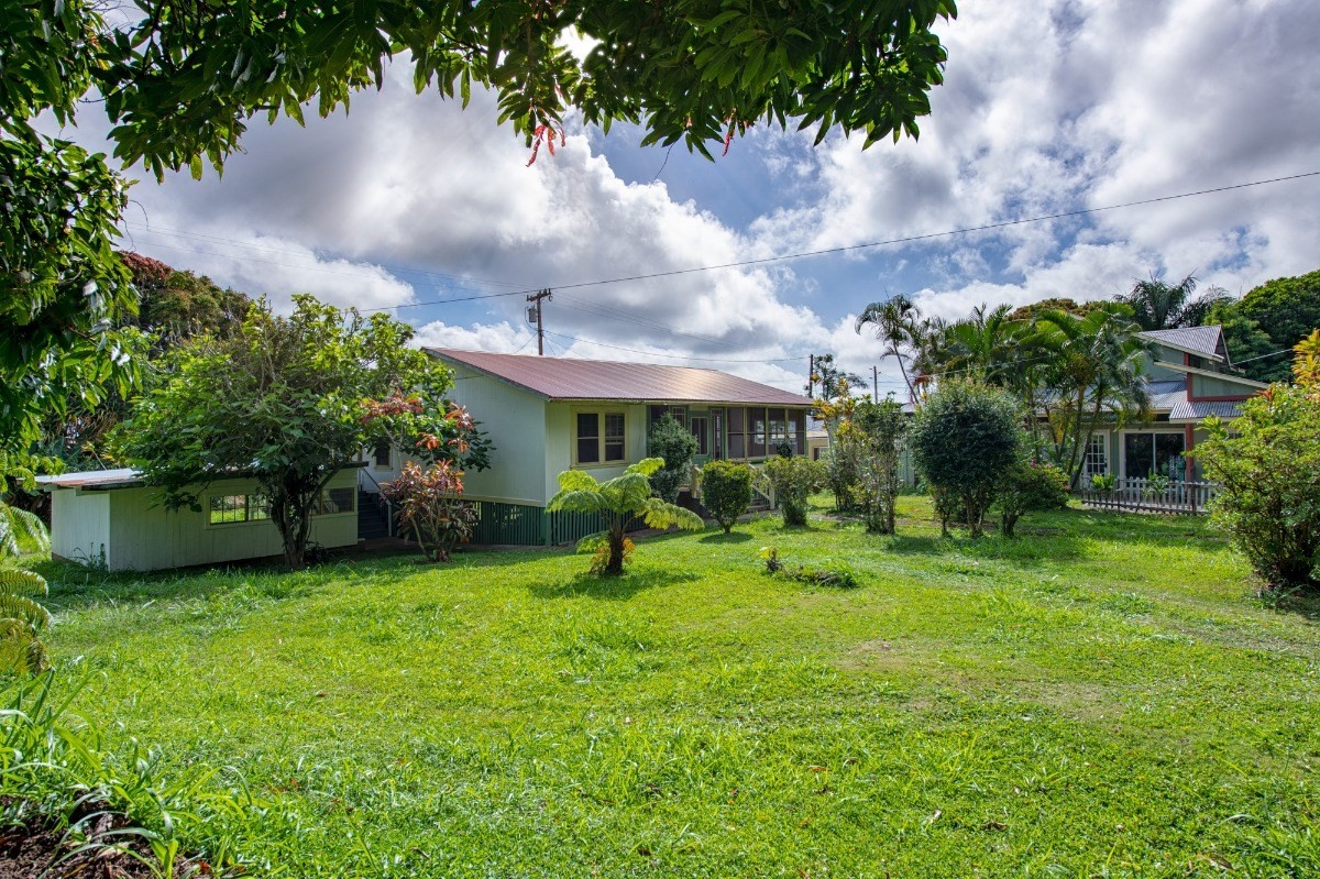 48-5314 Kukuihaele Road Honokaa, HI 96727 - Photo 1 of 24 a view of a house with a yard garden and sitting area