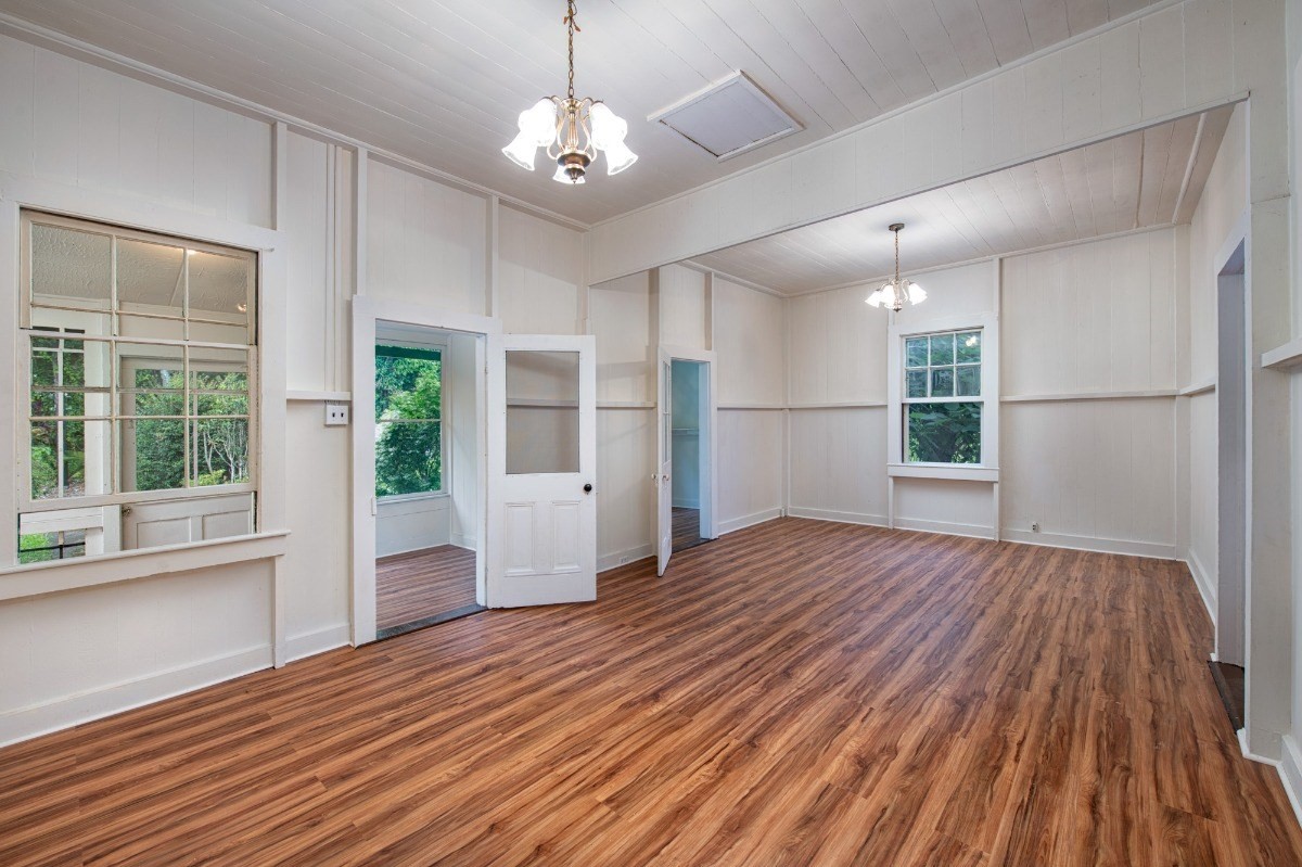 48-5314 Kukuihaele Road Honokaa, HI 96727 - Photo 6 of 24 a view of empty room with wooden floor and window