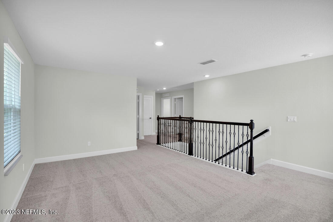 1074 Morgans Treasure Road St. Augustine, FL 32084 - Photo 7 of 11 a view of a hallway