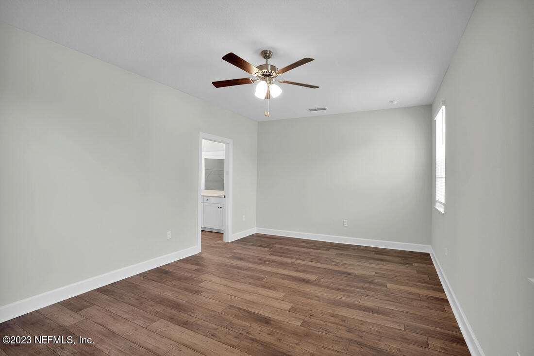 1074 Morgans Treasure Road St. Augustine, FL 32084 - Photo 8 of 11 a view of an empty room