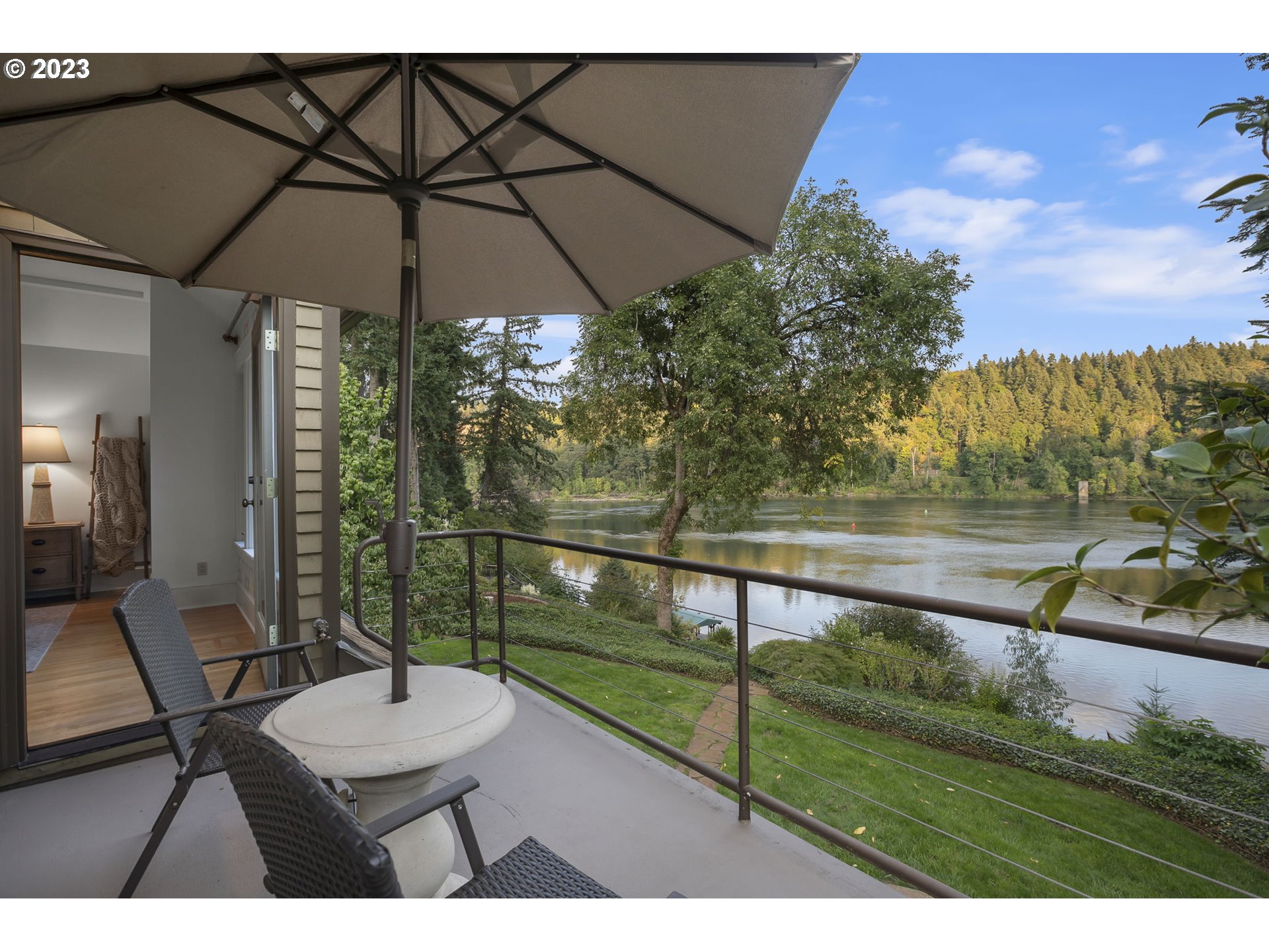 224 Southwest Forest Cove Road West Linn, OR 97068 - Photo 14 of 36 a view of house with backyard and outdoor seating