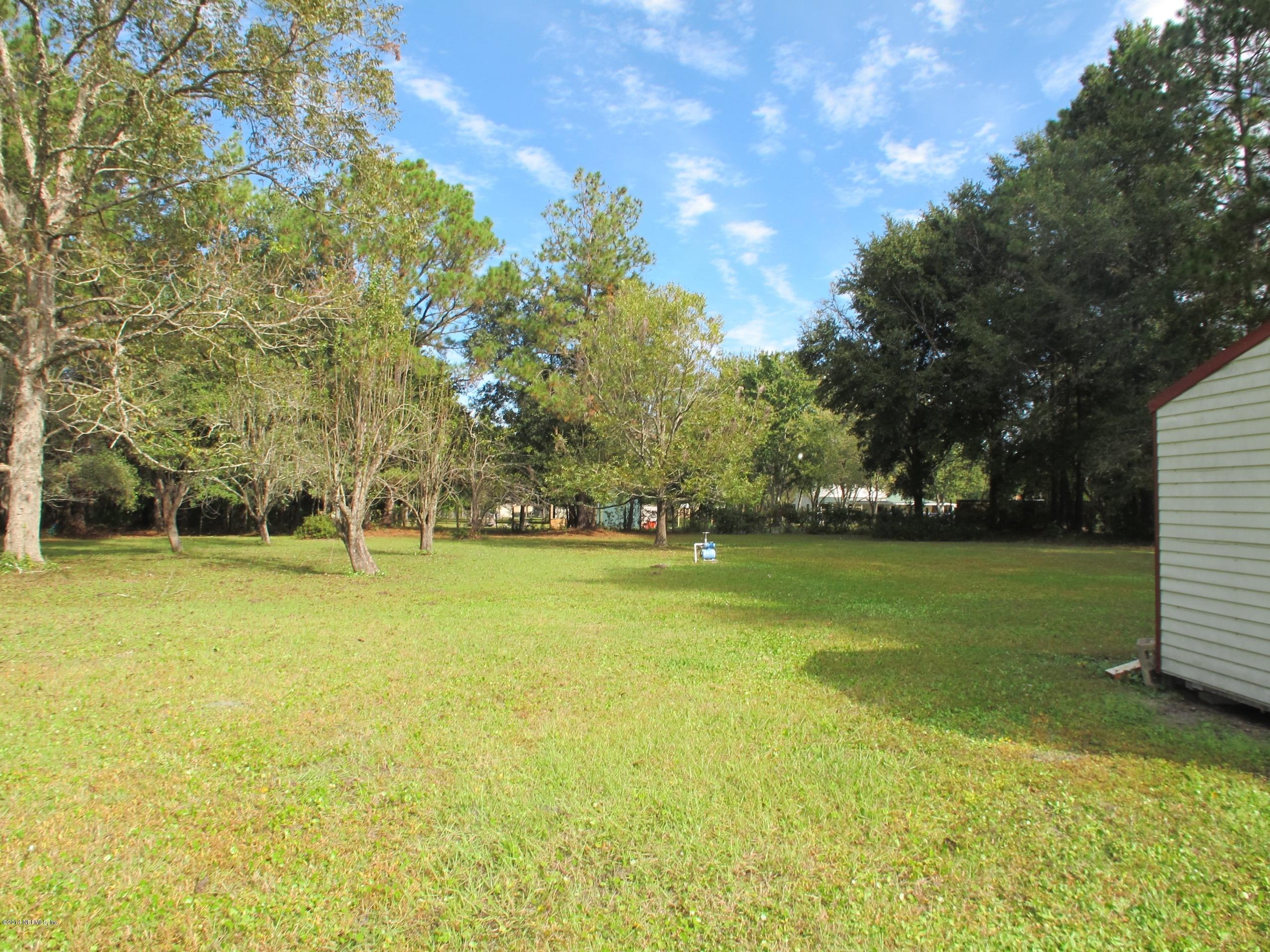 10593 Joes Road Jacksonville, FL 32221 - Photo 19 of 21 a view of swimming pool is middle in the garden