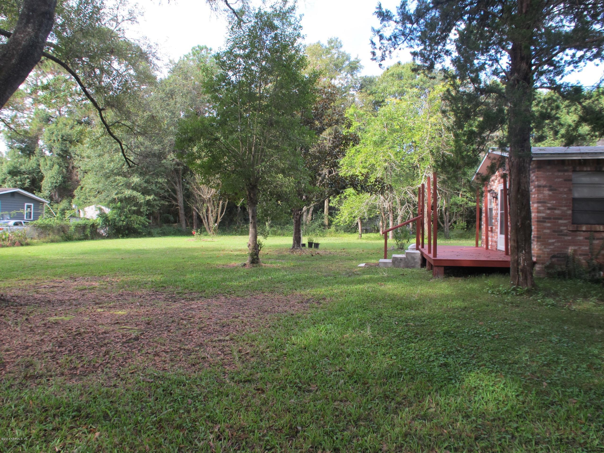 10593 Joes Road Jacksonville, FL 32221 - Photo 4 of 21 a view of a park with large trees