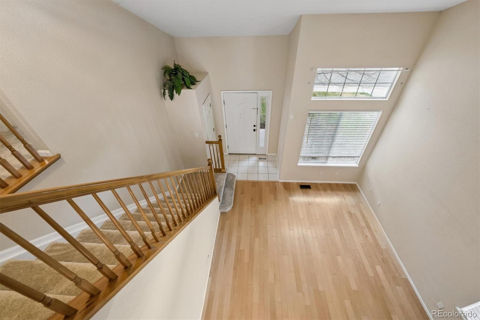 557 West Stellars Jay Drive Highlands Ranch, CO 80129 - Photo 17 of 41 a view of wooden floor