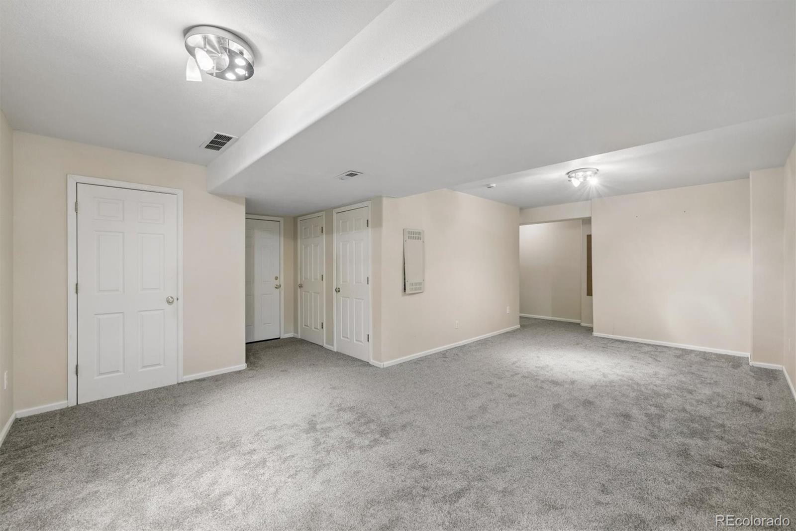 557 West Stellars Jay Drive Highlands Ranch, CO 80129 - Photo 26 of 41 a view of an empty room