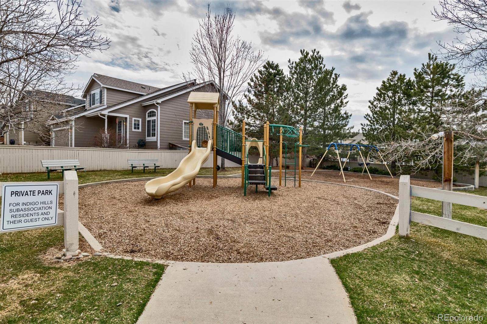 557 West Stellars Jay Drive Highlands Ranch, CO 80129 - Photo 35 of 41 a view of a house with a yard porch and sitting area