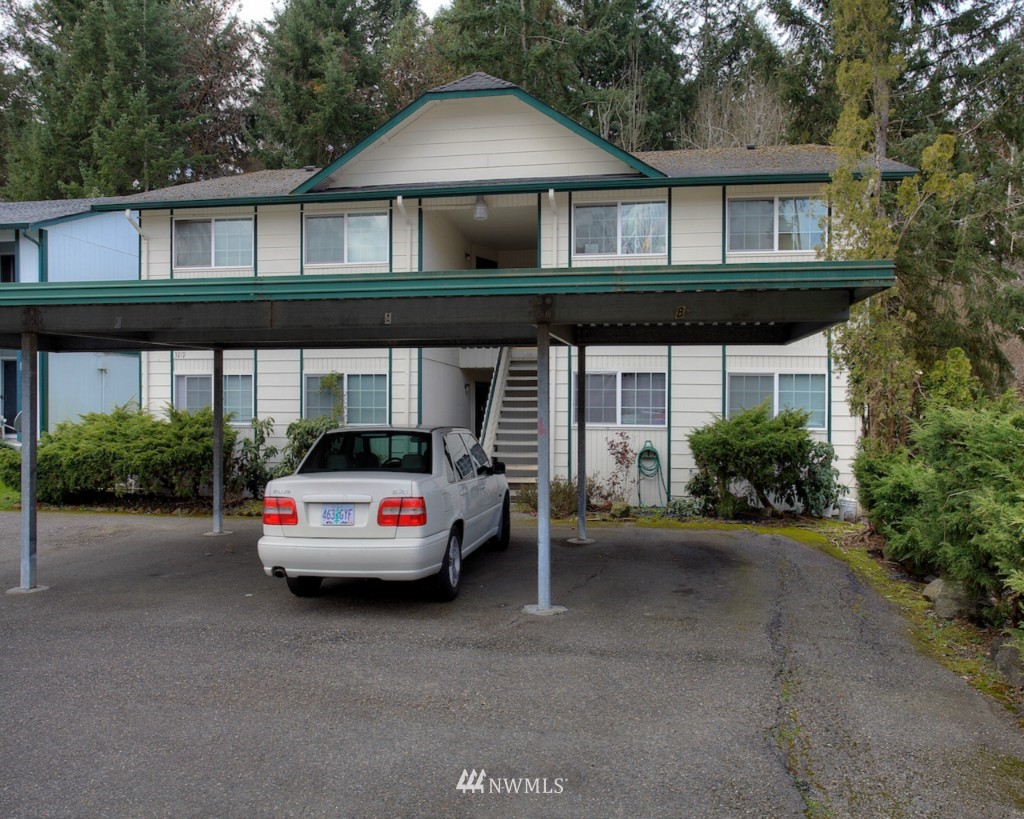 3919 Mason Loop Road Tacoma, WA 98409 - Photo 3 of 20 a house with outdoor space