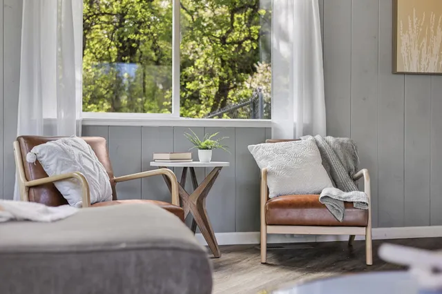 a bedroom with a bed and a mirror