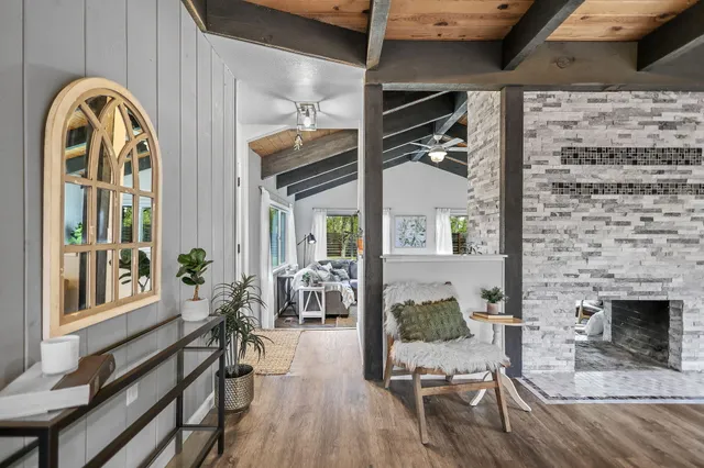 a view of house with outdoor space and swimming pool