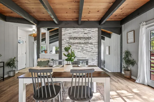 a view of an empty room with windows