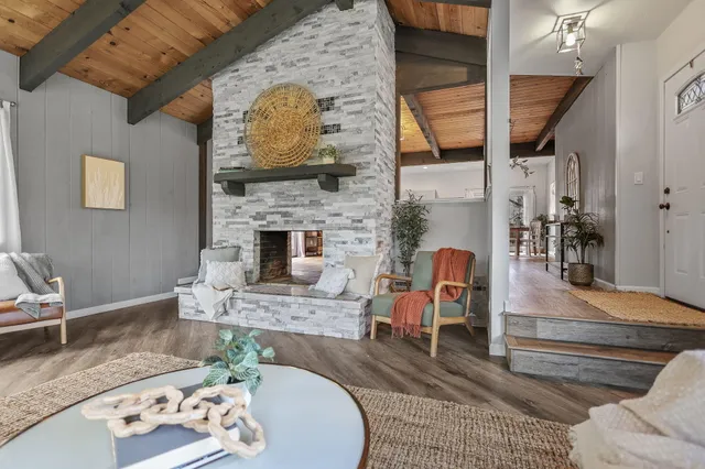 a bedroom with a bed and furniture