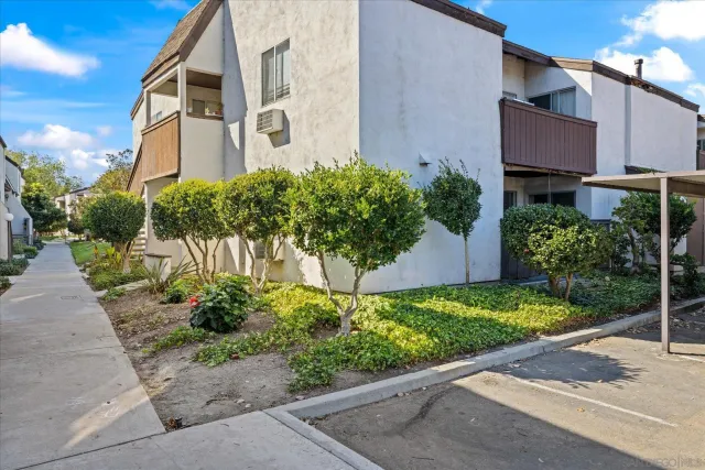 a swimming pool with outdoor seating