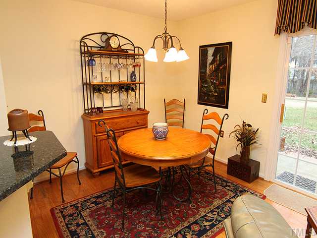 7753 Falcon Rest Circle Raleigh, NC 27615 - Photo 4 of 15 This separate dining area is great for casual meals as well as elegant gourmet dinners with your friends and family. It is open to the kitchen area, as well as the living room. Great entertaining layout!.