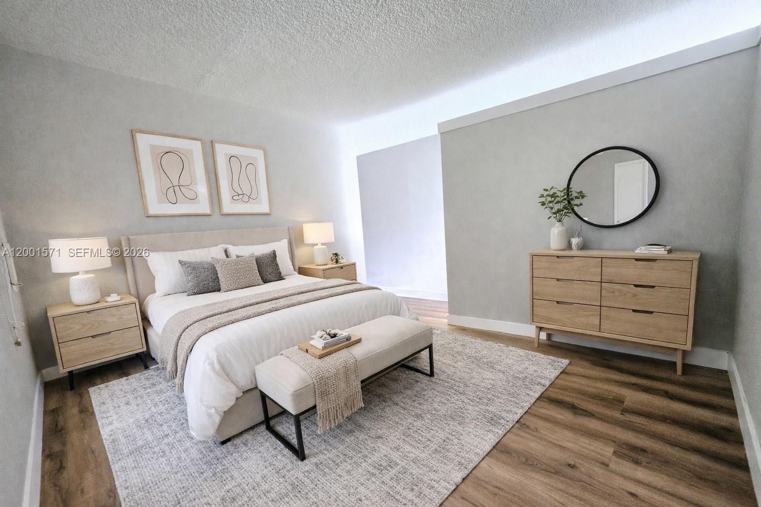 335 Southwest 20th Street, Unit 8 Fort Lauderdale, FL 33315 - Photo 8 of 11 a bedroom with a bed and closet