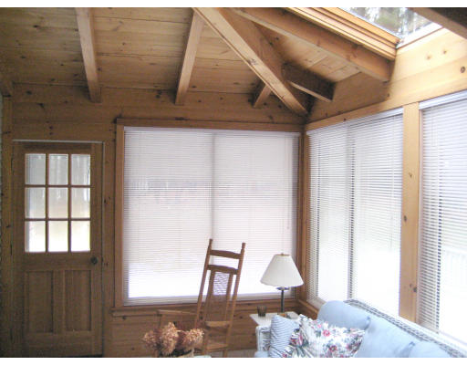 223 Littleton County Road Harvard, MA 01451 - Photo 17 of 26 a front view of a house with outdoor seating