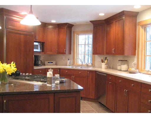 223 Littleton County Road Harvard, MA 01451 - Photo 8 of 26 a kitchen with a sink cabinets and window