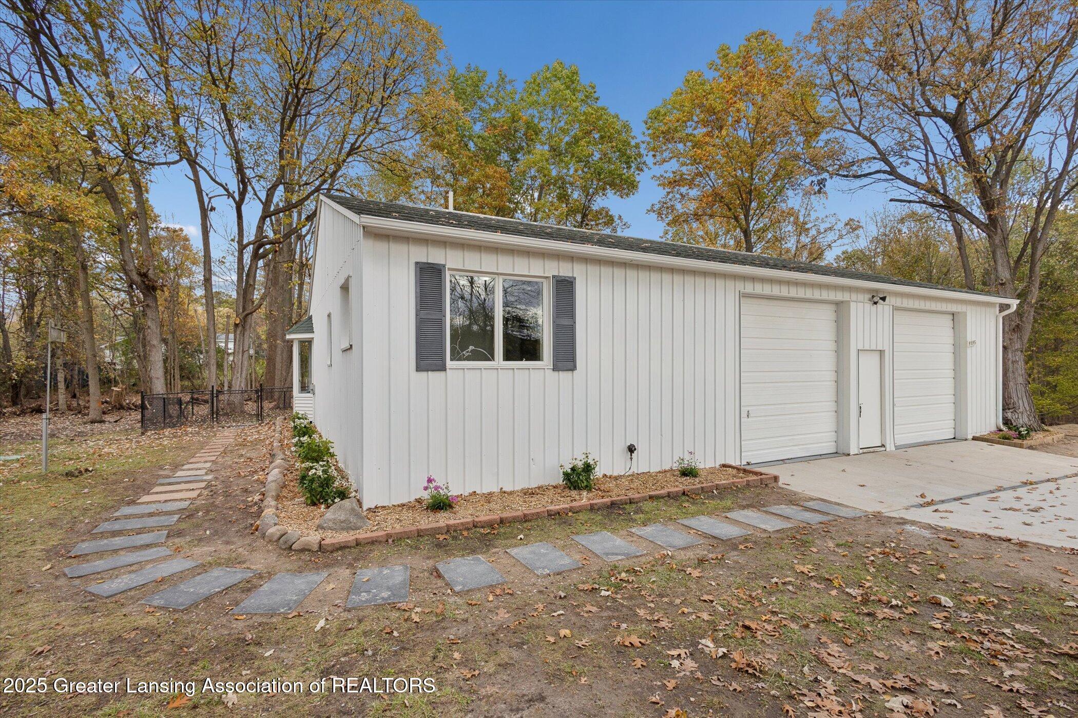 9595 East State Road Haslett, MI 48840 - Photo 4 of 47 02-9595-State-Rd-WindowStill-Photography