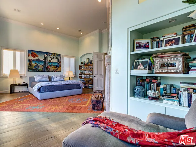 a view of a livingroom with furniture and a fireplace